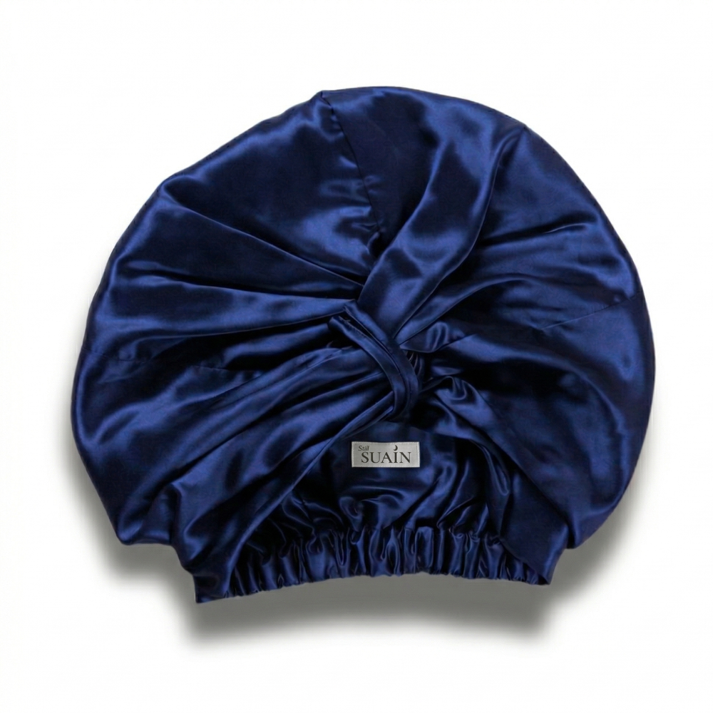 Organic Mulberry Silk Bonnet in Deep Blue, lifestyle
