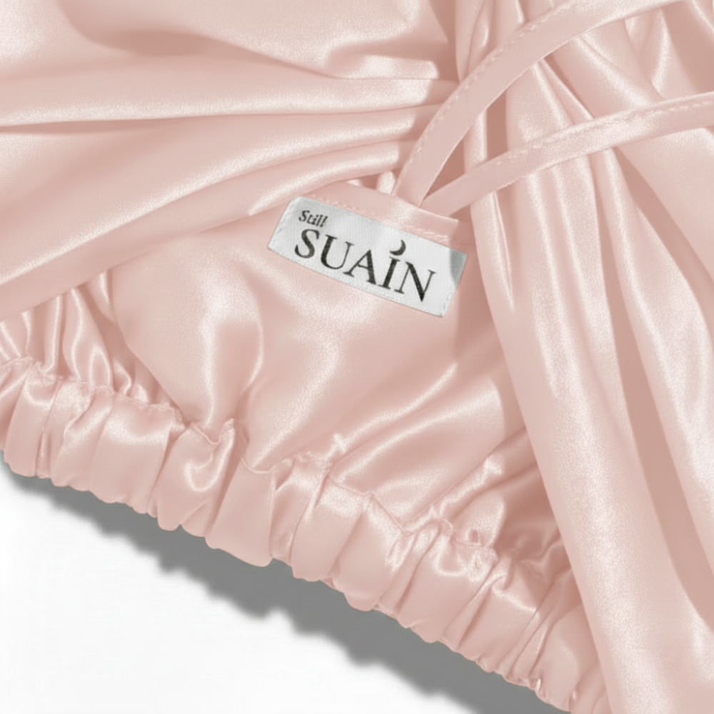 Organic Mulberry Silk Bonnet in Dawn Pink, lifestyle