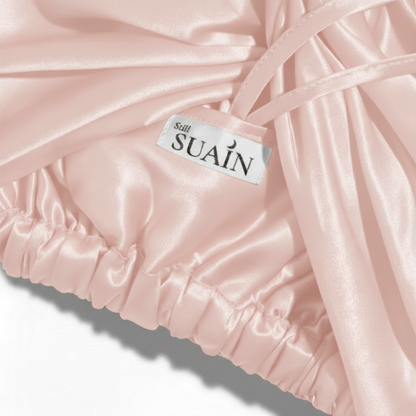 Organic Mulberry Silk Bonnet in Dawn Pink, lifestyle
