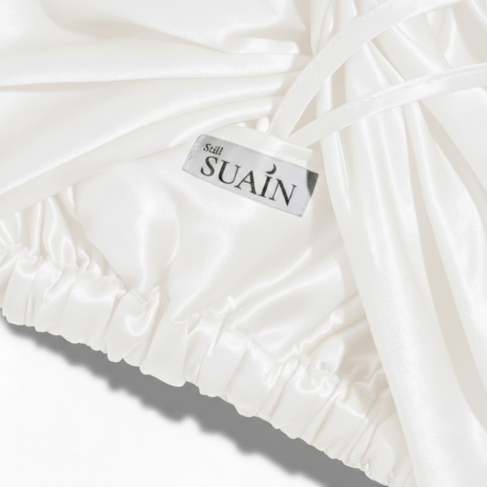 Organic Mulberry Silk Bonnet in Ivory White, lifestyle