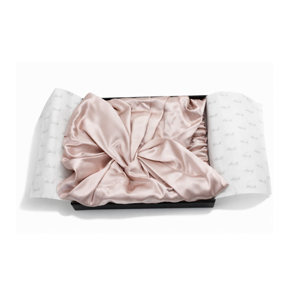 Organic Mulberry Silk Bonnet in Dawn Pink, lifestyle