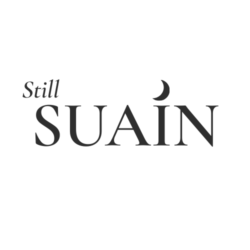 Logo with 'Still SUAIN' text on a white background